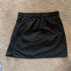 Black athletic golf skirt
